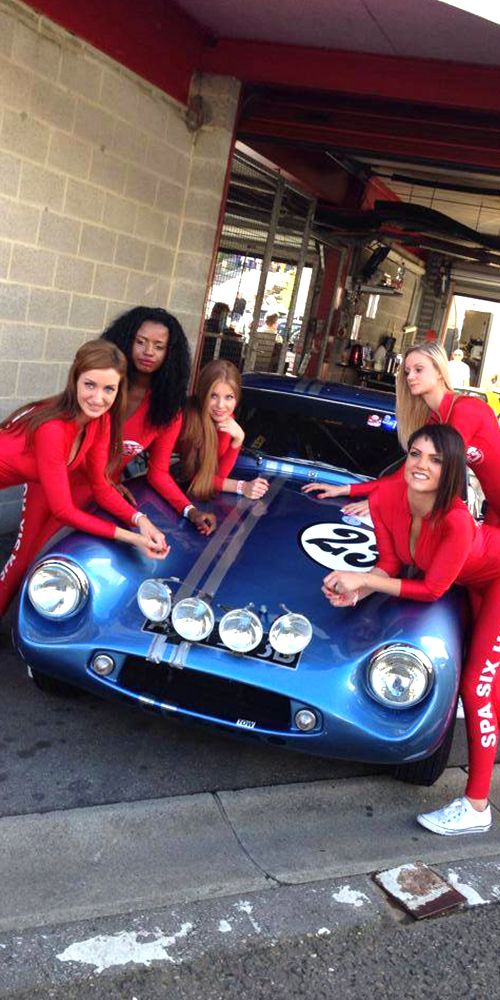 spa six pommery girls gathered around blue tvr grantura prepared by topcats racing for event