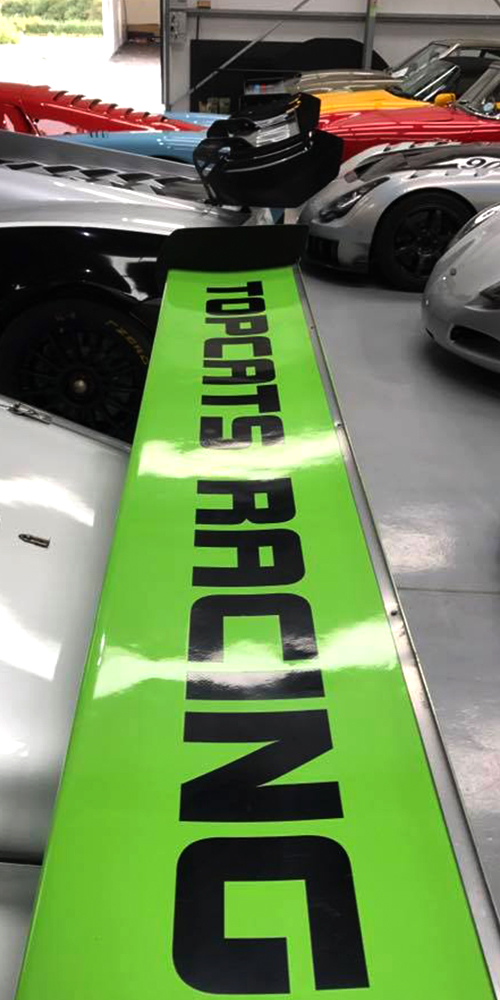 green topcats racing sticker on rear spoiler of marcos mantis