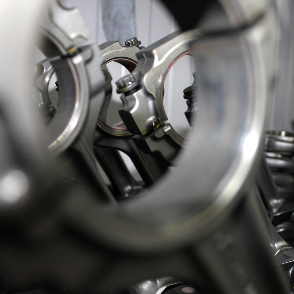 close up of engine internals being assembled at topcats racing workshop