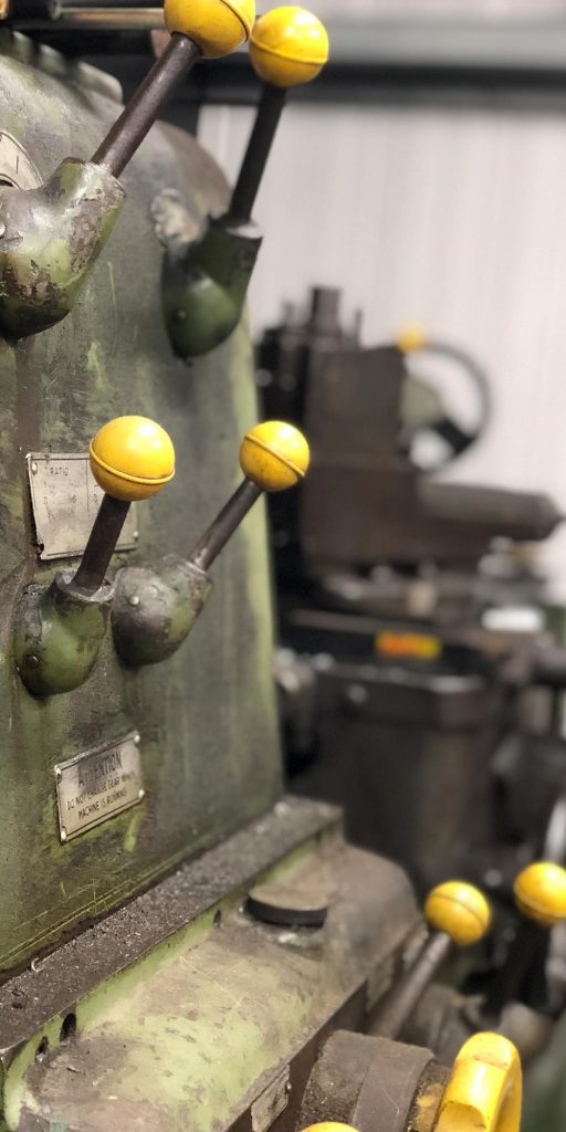 close up of lathe controls at topcats racing workshop