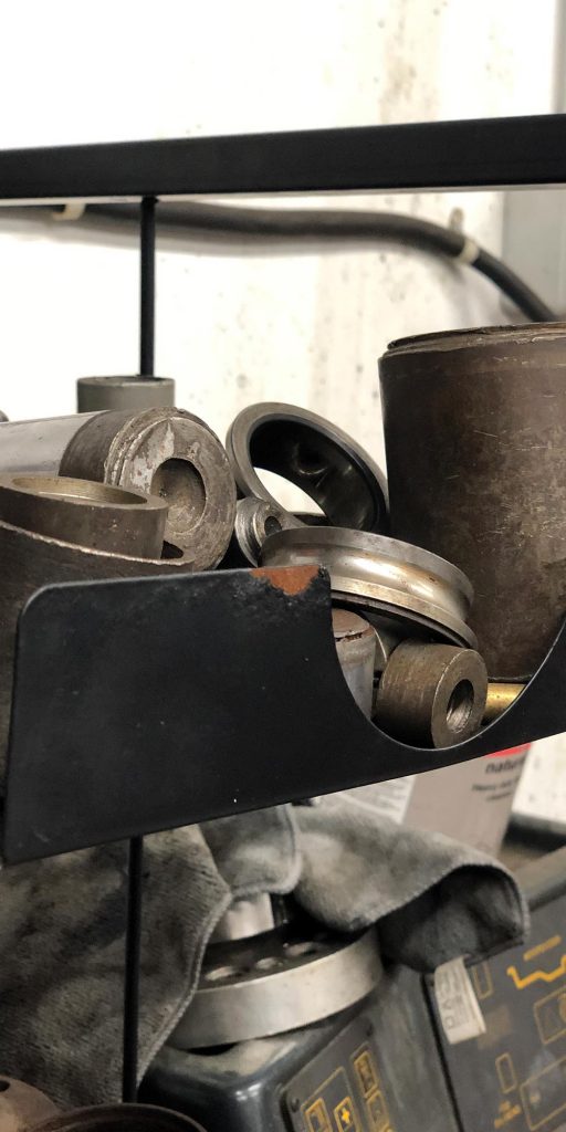 close up of a variety of press tools at topcats racing workshop